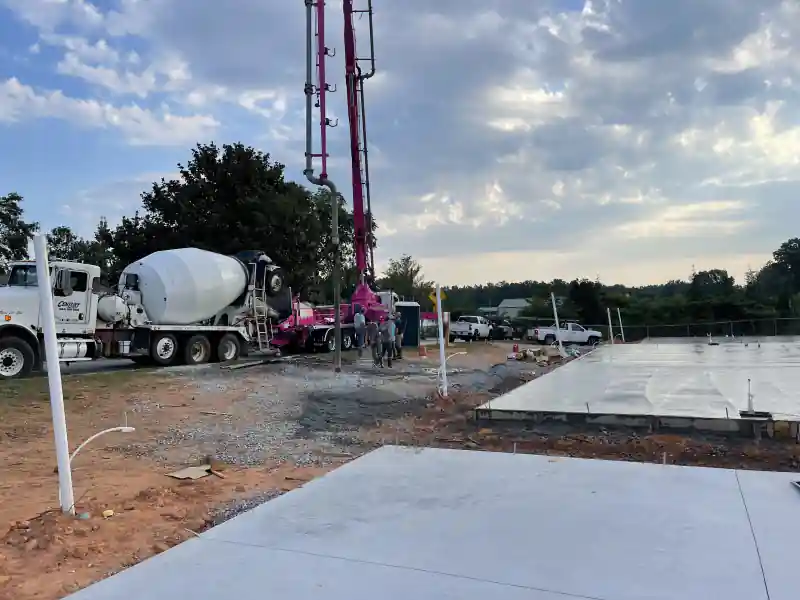 An Ace Concrete Construction work truck on a job site