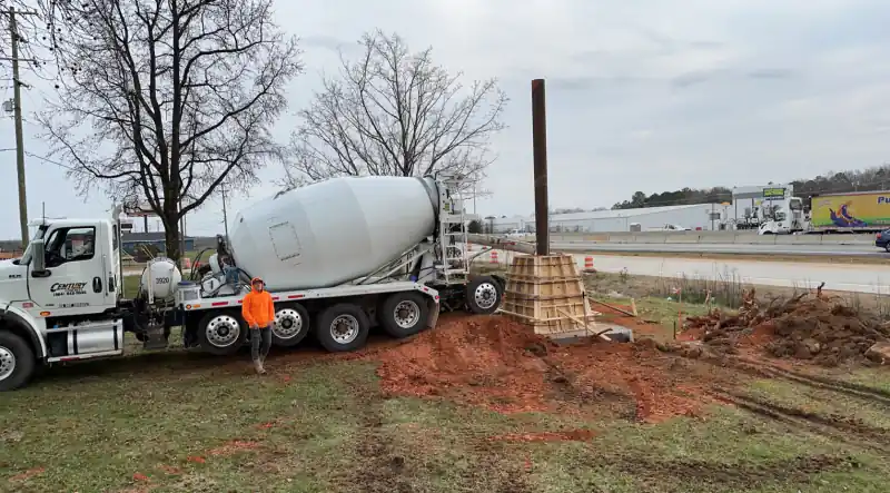 An Ace Concrete Construction work truck on a job site