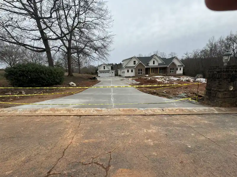 A concrete driveway poured by Ace Concrete Construction