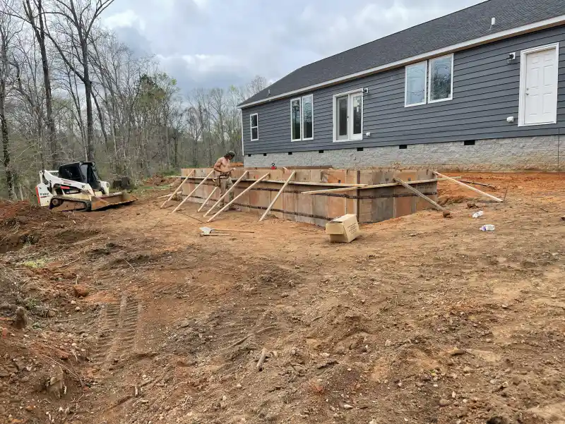 Concrete patio and outdoor living area poured by Ace Concrete Construction