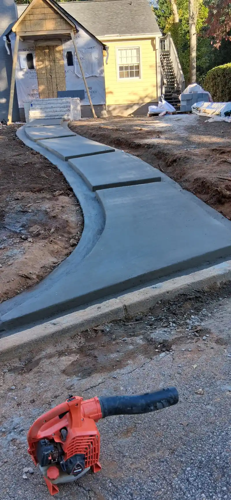 Concrete patio and outdoor living area poured by Ace Concrete Construction