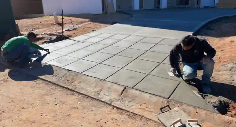 A concrete patio and outdoor living area poured by Ace Concrete Construction