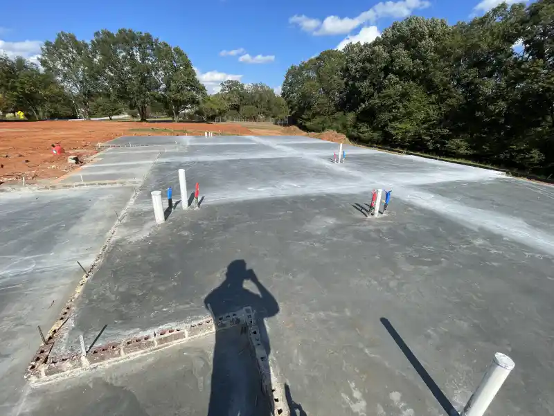 A poured building slab with a formed perimeter edge.
