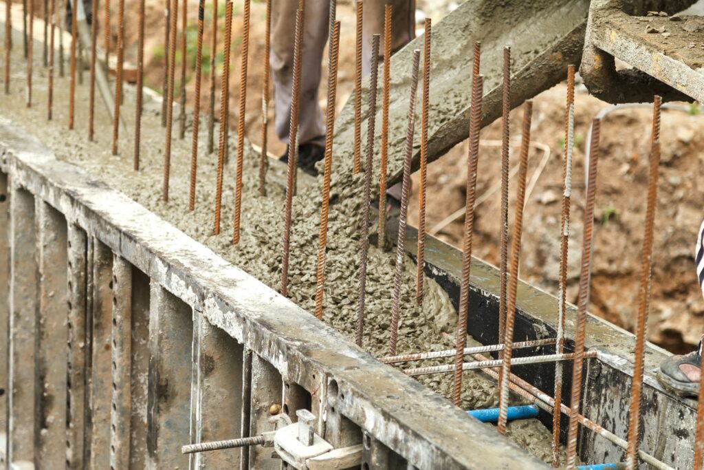 Architectural concrete stairs being meticulously formed and poured by Ace Concrete.